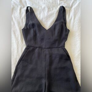 Aritzia romper 
small 
black
ties in the back
Perfect condition